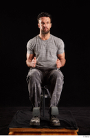  Larry Steel  1 boots dressed grey camo trousers grey t shirt shoes sitting whole body 0015.jpg